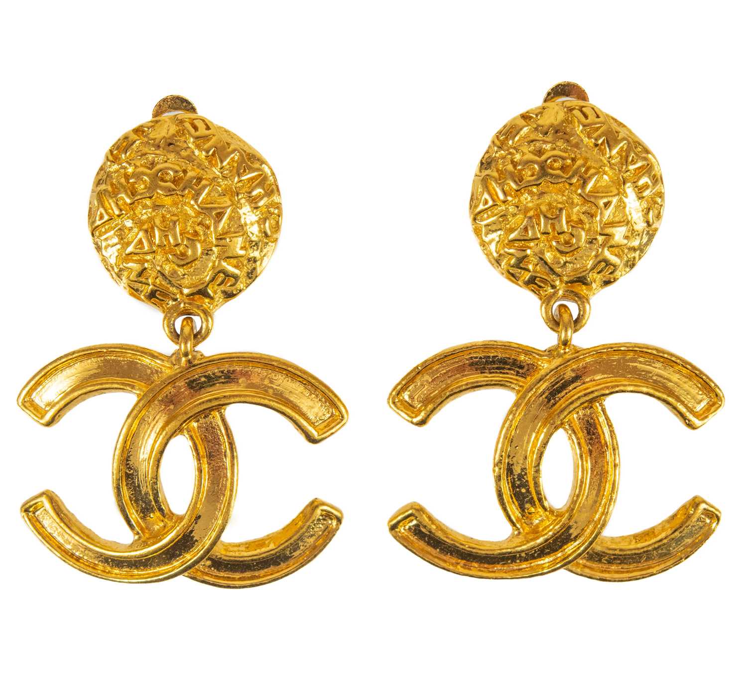 Lot 387 - A Chanel pair of CC pendant clip earrings.