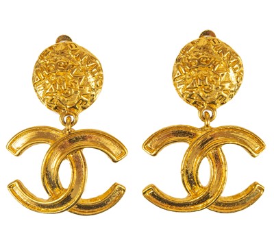 Lot 387 - A Chanel pair of CC pendant clip earrings.