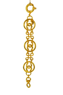 Lot 129 - A Chanel CC three medallion bracelet.