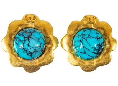 Lot 339 - A Chanel pair of turquoise set clip earrings.