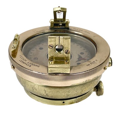 Lot 260 - A WW2 era brass Air Ministry landing compass.