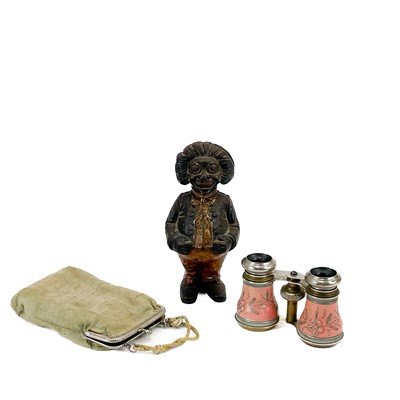 Lot 244 - An early 20th century cast metal figural money box.