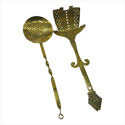 Lot 235 - A brass cream skimmer, circa 1900, pierced...