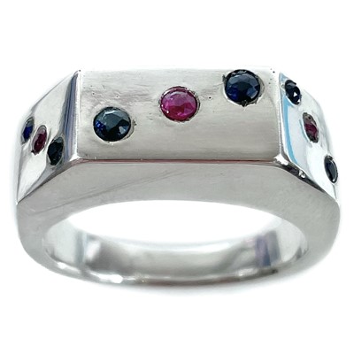 Lot 248 - A contemporary 999 fine silver ruby and sapphire 'Domino' ring by James Suddaby.