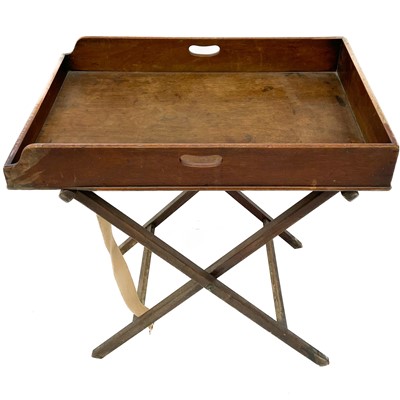 Lot 1902 - A Victorian mahogany butlers tray with folding stand.