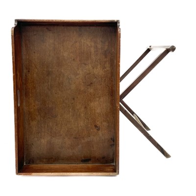 Lot 1902 - A Victorian mahogany butlers tray with folding stand.