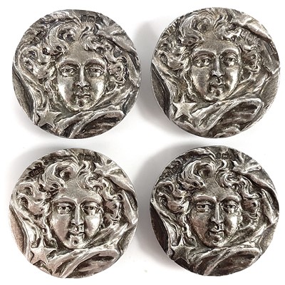 Lot 157 - An Edwardian Art Nouveau silver set of four buttons by Peach Brothers.