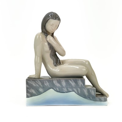 Lot 874 - A  B&G Royal Copenhagen mermaid figure.