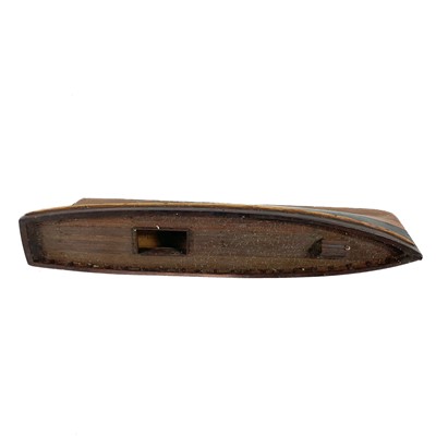 Lot 507 - An early 20th century painted wood model pond yacht with lead keel.