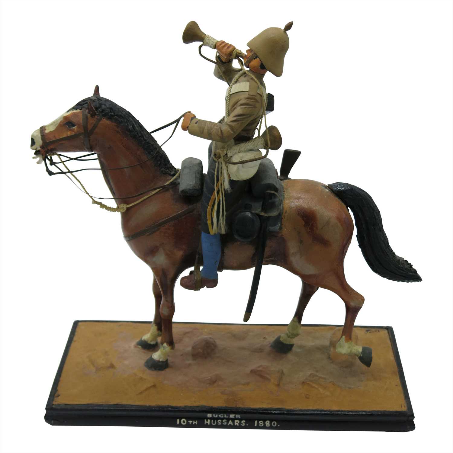 Lot 255 - A carved and painted mounted figure, 'Bugler,