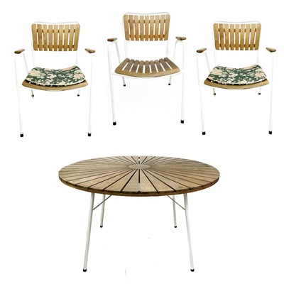 Lot 610 - A Danish garden table and three chairs by Daneline