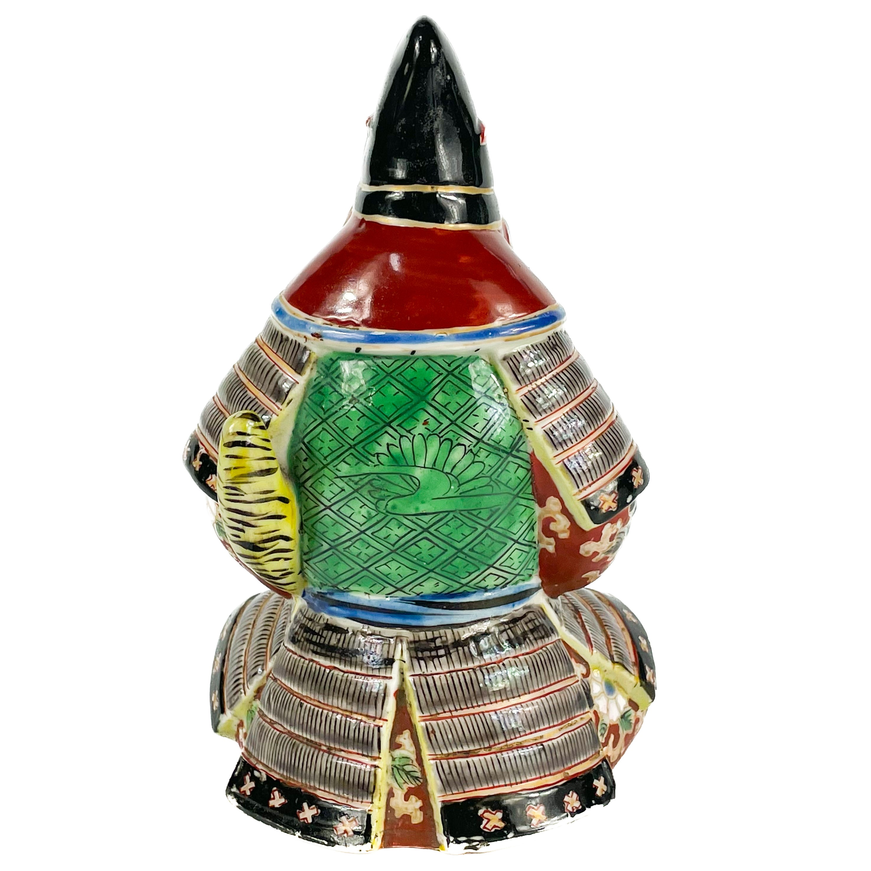 Lot 380 - A Japanese porcelain model of a samurai