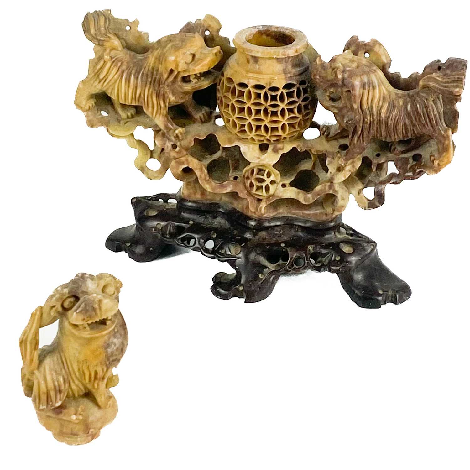 Lot 390 A Chinese soapstone 'dogs of fo' carving.