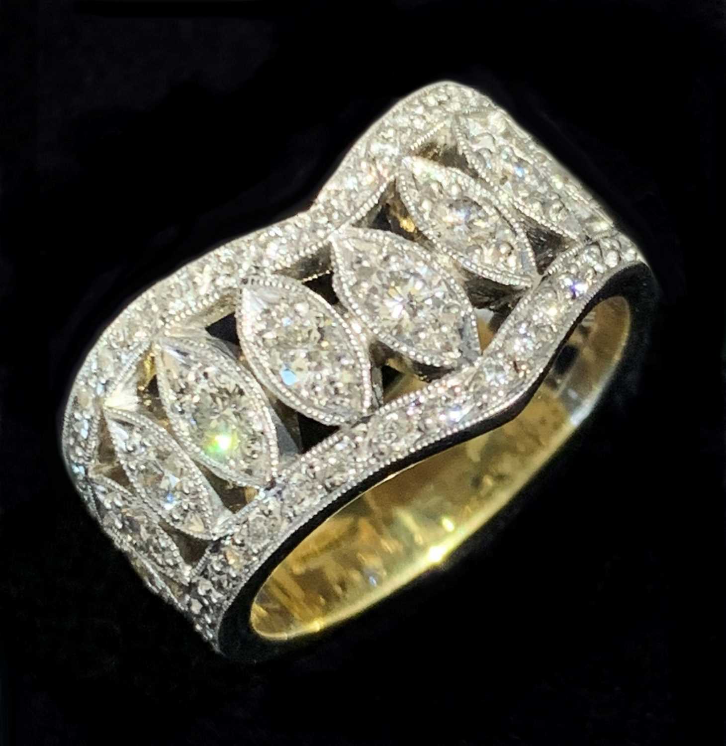 Lot 2751 - A fine 18ct double wishbone ring with a row of...