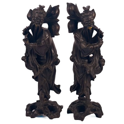 Lot 395 - A pair of Chinese carved rootwood figures, late 19th century.