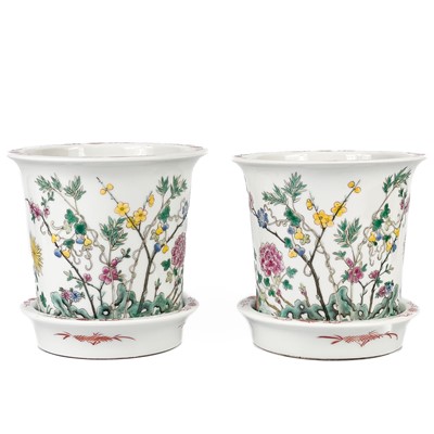 Lot 1237 - A pair of Chinese famille rose porcelain jardinieres on stands, 20th century.