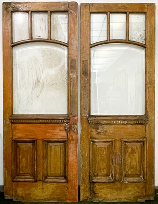 Lot 1943 - A pair of glazed oak exterior doors.