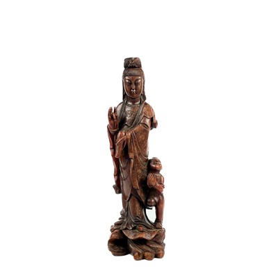 Lot 402 - A Chinese carved wood figure of Guanyin, 19th century.