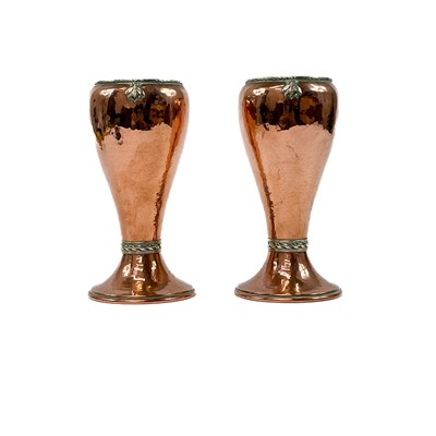 Lot 289 - A pair of Arts & Crafts copper vases.