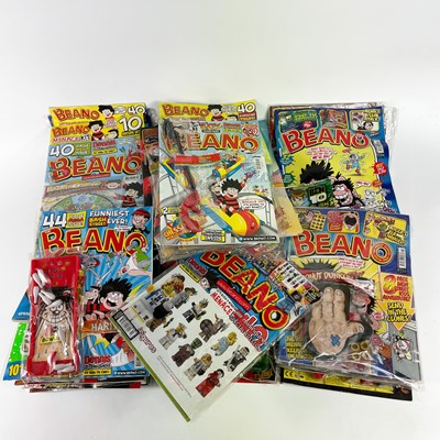 Lot 814 - Beano Comics with Special Gifts in Original Packaging (x40).