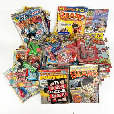 Lot 817 - Beano Comics with Special Gifts in Original Packaging (x57)