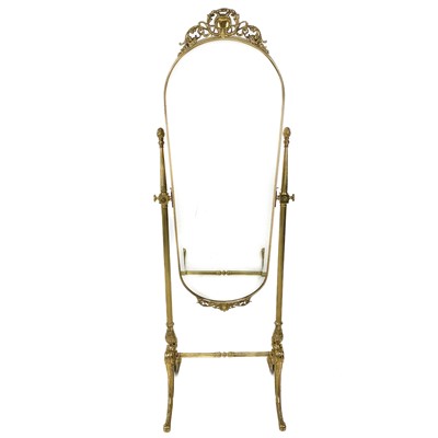 Lot 1967 - An ornate brass cheval mirror.