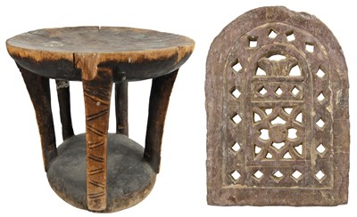 Lot 13 - A pierced stone screen & an African stool