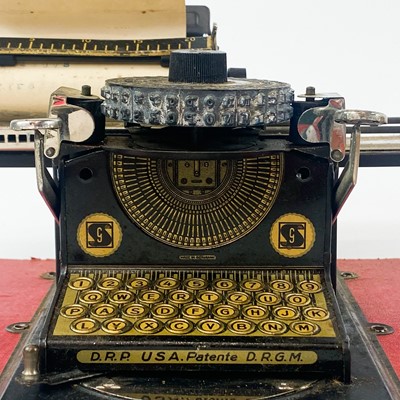 Lot 797 - Child's DRGM Cylindrical Wheel Tinplate Typewriter.