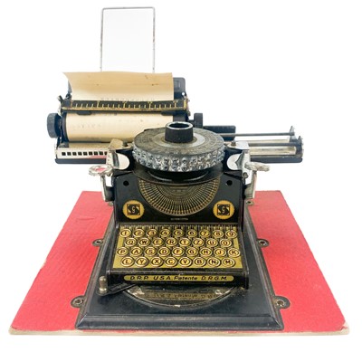 Lot 797 - Child's DRGM Cylindrical Wheel Tinplate Typewriter.