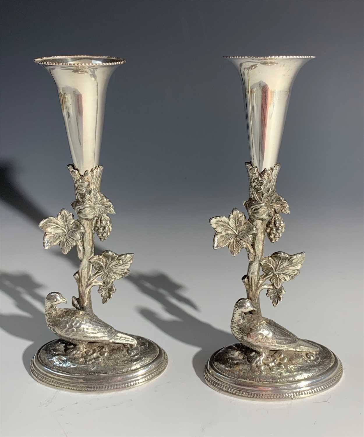 Lot 2306 - A pair of silver plated spill vases, each...