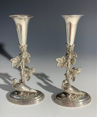 Lot 2306 - A pair of silver plated spill vases, each...