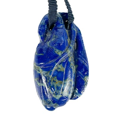 Lot 523 - A Chinese lapis lazuli pendant in the form of a gourd.