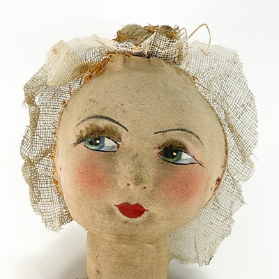 Lot 840 - Pressed Felt Painted Face Doll with Porcelain Legs/Hands.