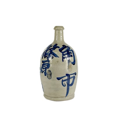 Lot 529 - A Japanese glazed stoneware ovoid saki bottle, circa 1900.