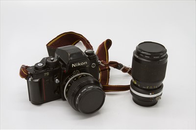 Lot 287 - A Nikon F3 SLR camera, with two lenses,...