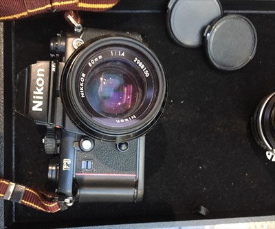 Lot 287 - A Nikon F3 SLR camera, with two lenses,...