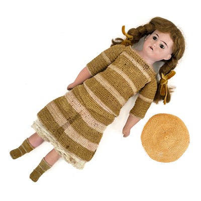 Lot 854 - Porcelain Faced Armand Marseilles Doll in Wicker Crib.