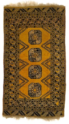 Lot 133 - A golden Afghan rug, mid 20th century.