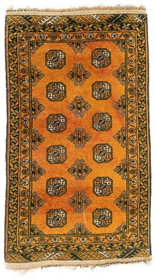 Lot 134 - A golden Afghan rug, mid 20th century.