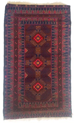 Lot 140 - A Belouch rug, mid-late 20th century.