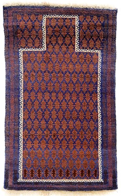 Lot 145 - A Belouch prayer rug, mid-late 20th century.