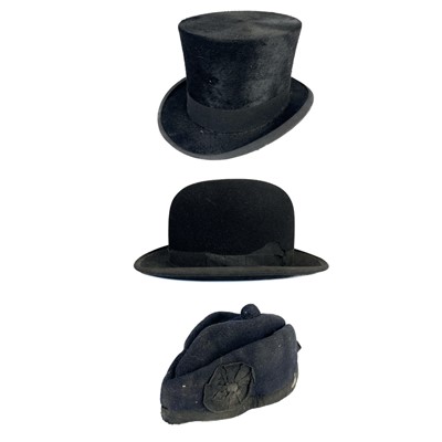 Lot 111 - A Christy's London silk top hat and a Falcon bowler hat.