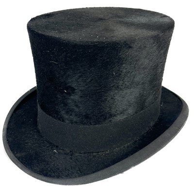 Lot 111 - A Christy's London silk top hat and a Falcon bowler hat.