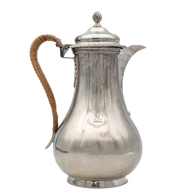 Lot 324 - A Victorian silver baluster hot water jug by John Henry Rawlings.