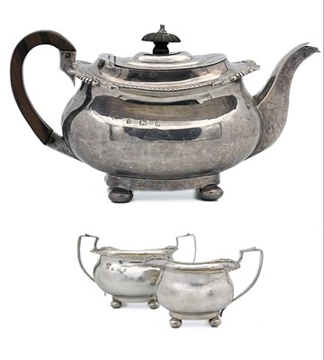 Lot 260 - A Victorian silver three piece tea set by Thomas Hayes.