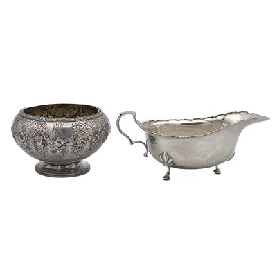 Lot 23 - A Victorian silver pedestal sugar bowl and a George V silver sauce jug.