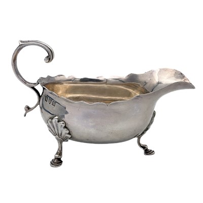 Lot 77 - A Victorian silver sauce jug by George Nathan & Ridley Hayes.