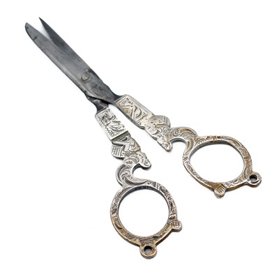 Lot 410 - A pair of 19th century Dutch silver sewing scissors and a silver needle case.
