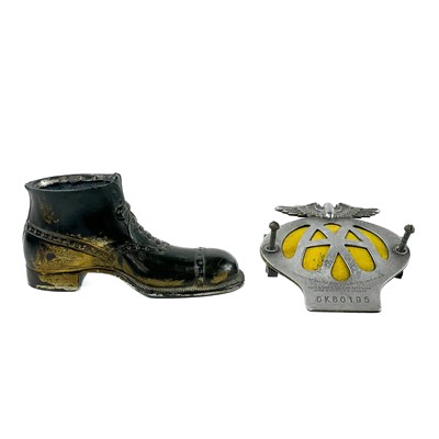 Lot 114 - An AA car badge and a shoe pin cushion base.