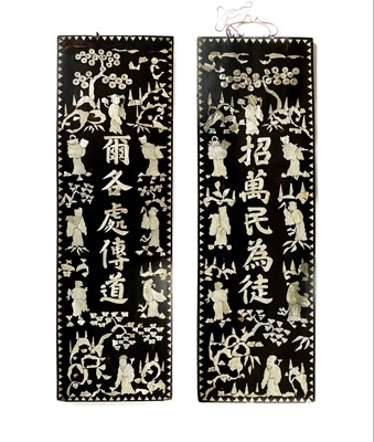 Lot 115 - A pair of Chinese mother of pearl and black lacquer panels, circa 1900.